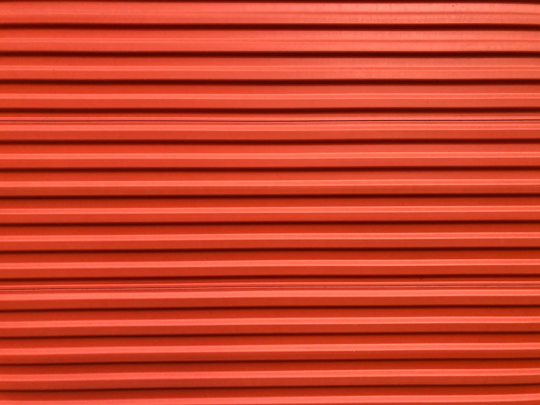 Orange Self Storage Unit Corrugated Metal Background