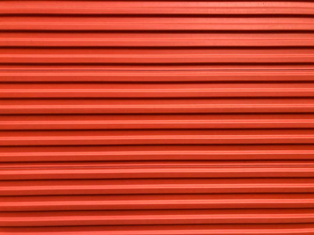Orange Self Storage Unit Corrugated Metal Background